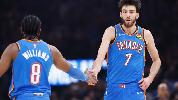 Dec 26, 2023; Oklahoma City, Oklahoma, USA; Oklahoma City Thunder forward Chet Holmgren (7) celebrates with Oklahoma City Thunder forward Jalen Williams (8) after scoring against the Minnesota Timberwolves during the first quarter at Paycom Center.